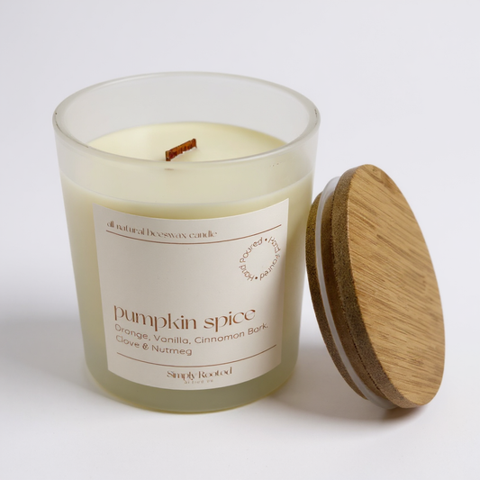 10 oz pumpkin spice beeswax candle with wooden lid on a white background